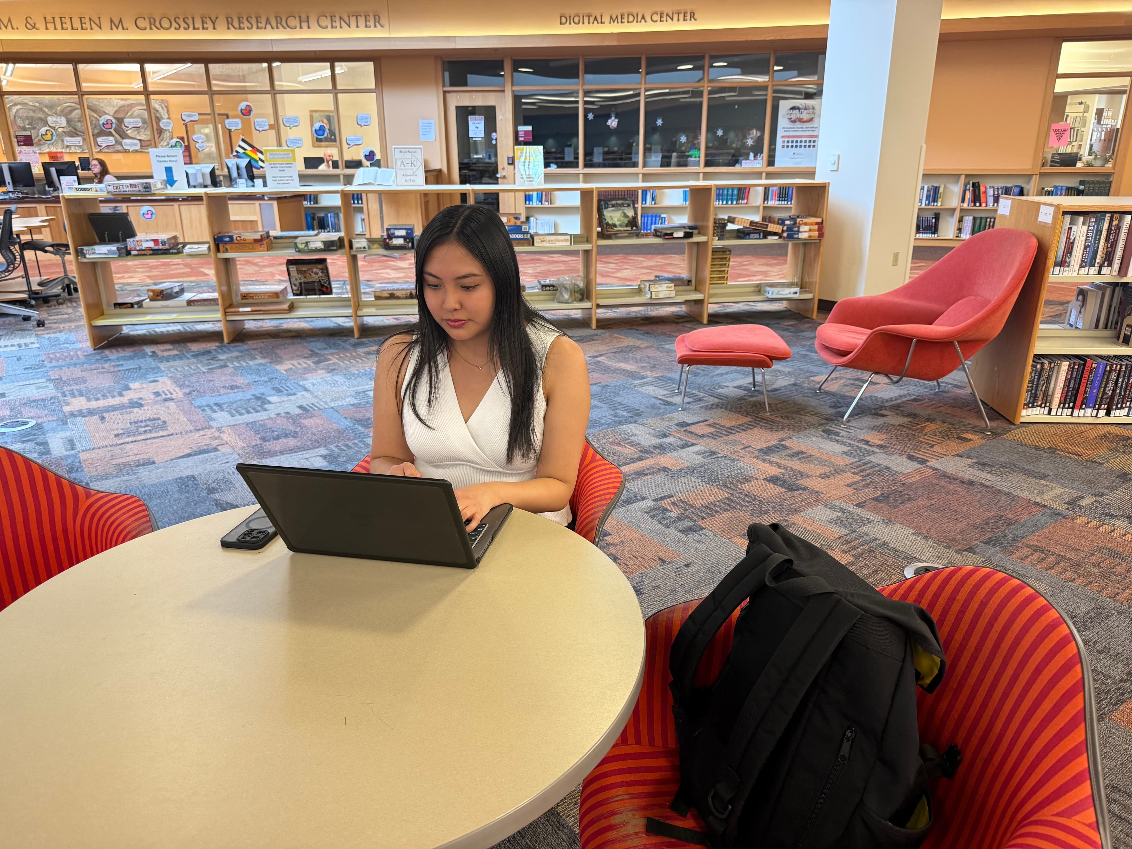 Kaylin Francisco, Cobell Undergraduate Scholar, in a university library